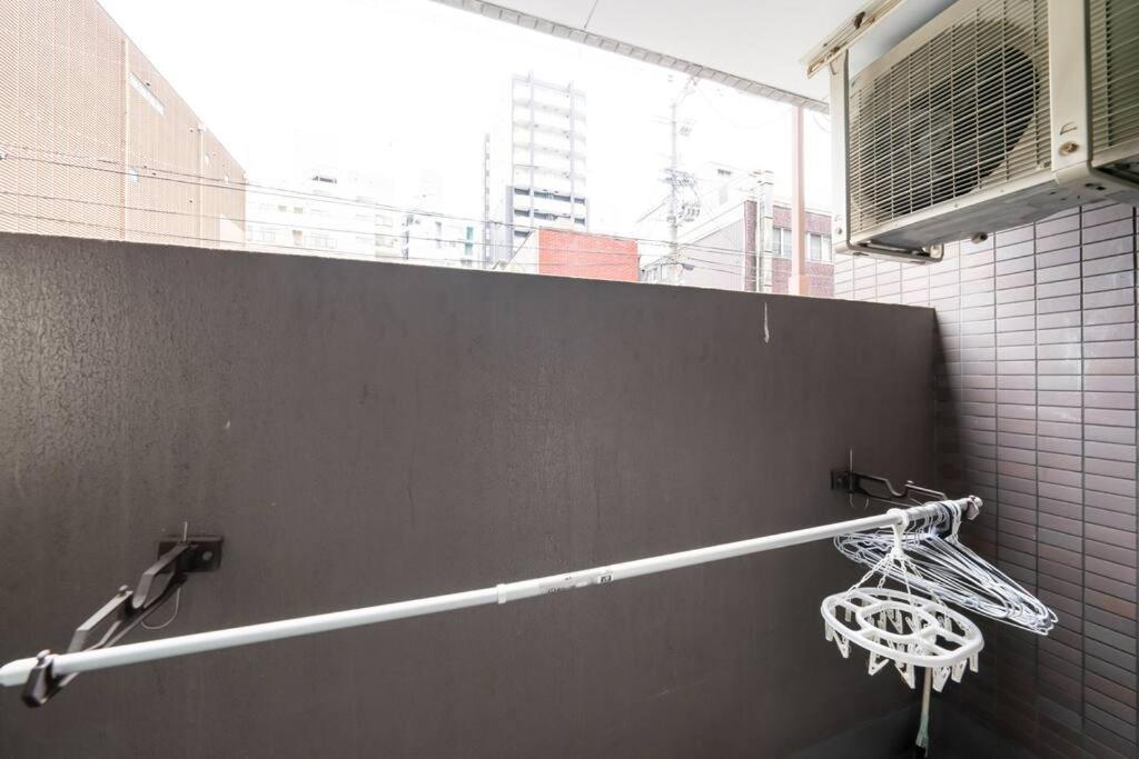 難波駅、道頓堀のそばでシンプルステイ　ベッド3台のお部屋 Apartment *